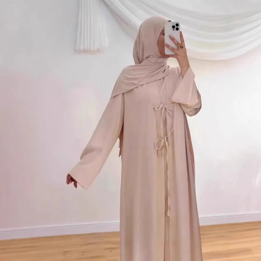 two-piece cardigan jacket and a sleeveless inner dress