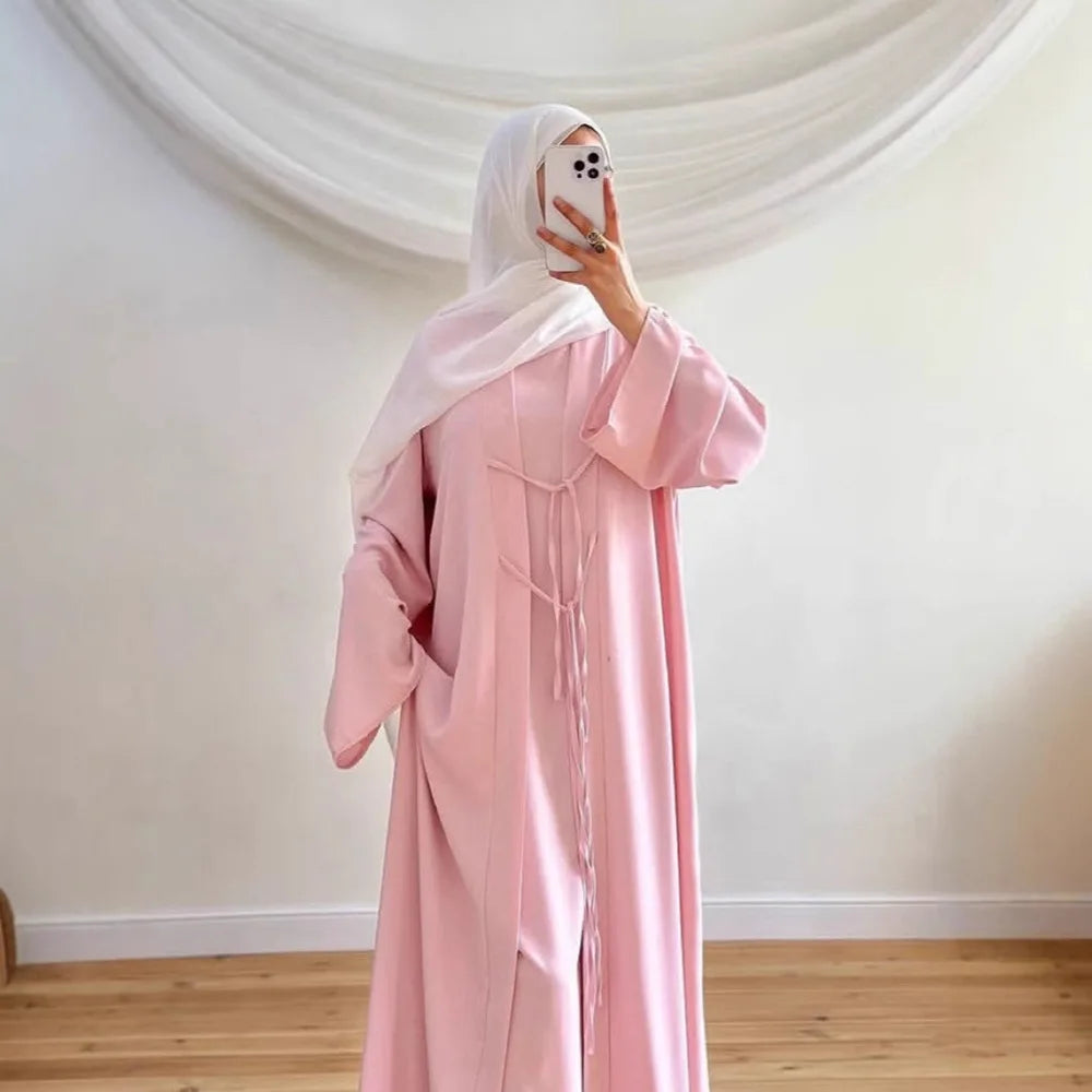 two-piece cardigan jacket and a sleeveless inner dress