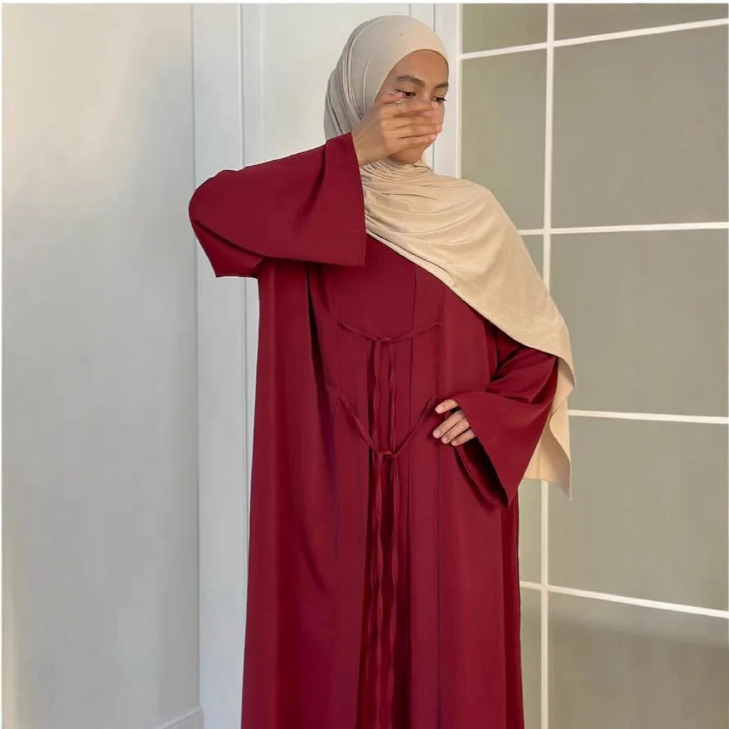 two-piece cardigan jacket and a sleeveless inner dress