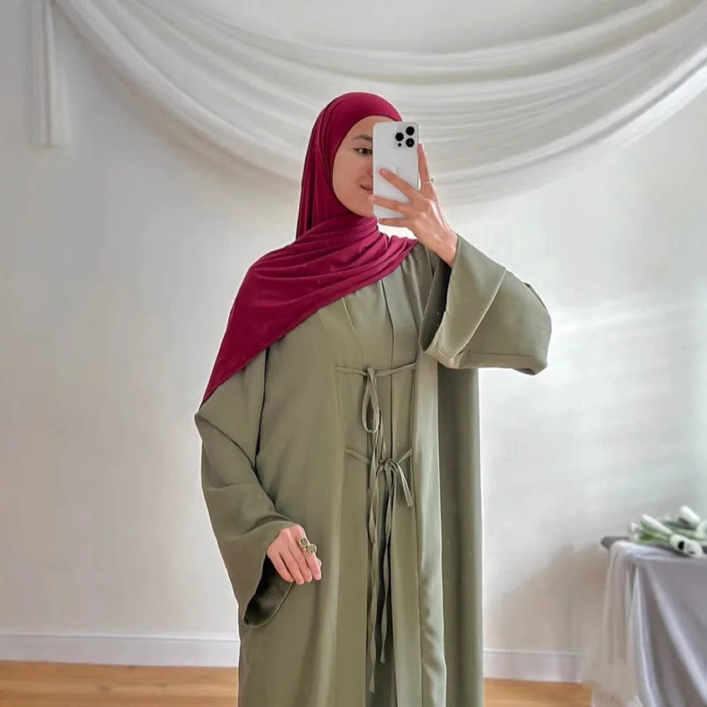 two-piece cardigan jacket and a sleeveless inner dress