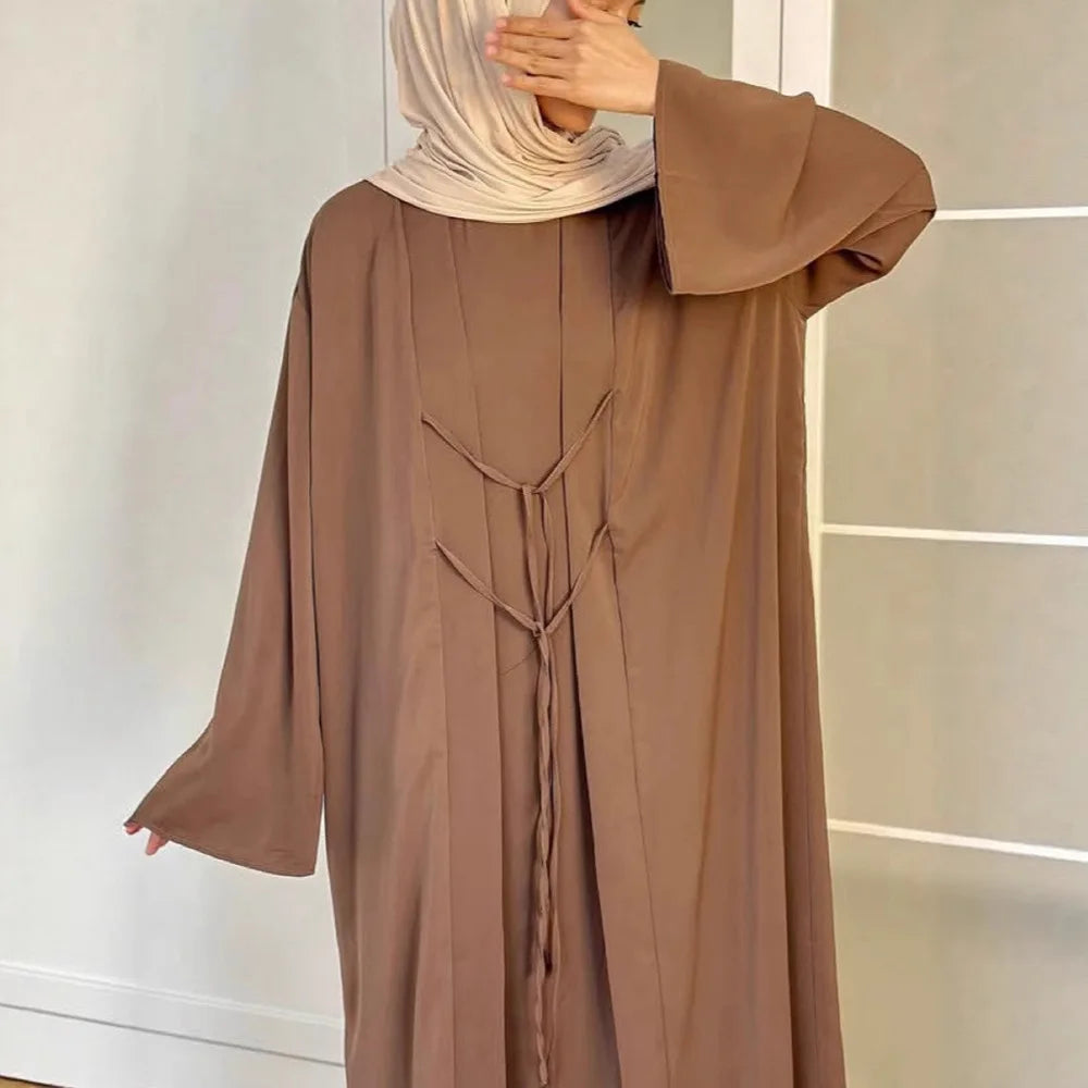 two-piece cardigan jacket and a sleeveless inner dress