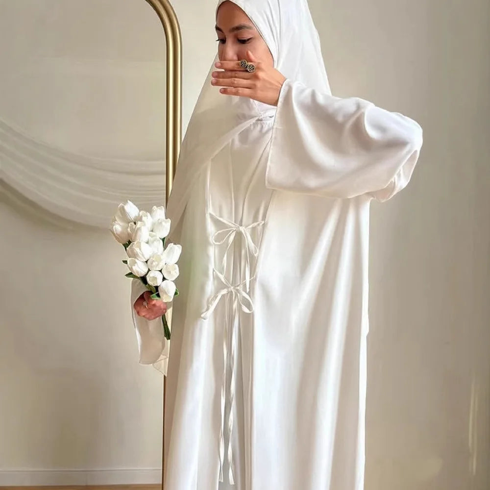 two-piece cardigan jacket and a sleeveless inner dress
