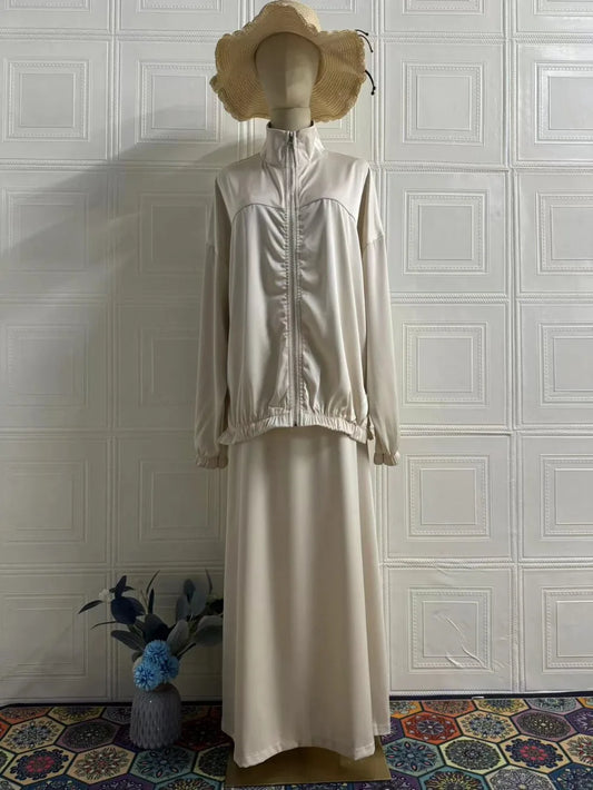 Satin zip set with flowy skirt.